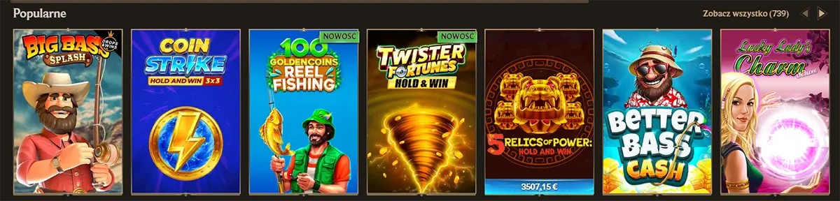 Popular slot games section with colorful game thumbnails including Big Bass Splash, Coin Strike, Golden Coins Reel Fishing, Twister Fortunes, Better Bass Cash, and Lucky Lady’s Charm, plus a “Zobacz wszystko” link on a dark casino interface.