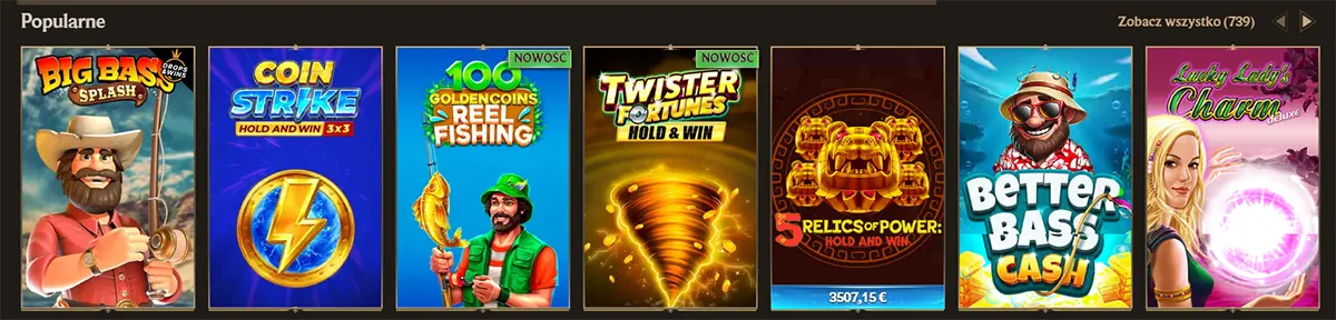 Popular slot games section with colorful game thumbnails including Big Bass Splash, Coin Strike, Golden Coins Reel Fishing, Twister Fortunes, Better Bass Cash, and Lucky Lady’s Charm, plus a “Zobacz wszystko” link on a dark casino interface.